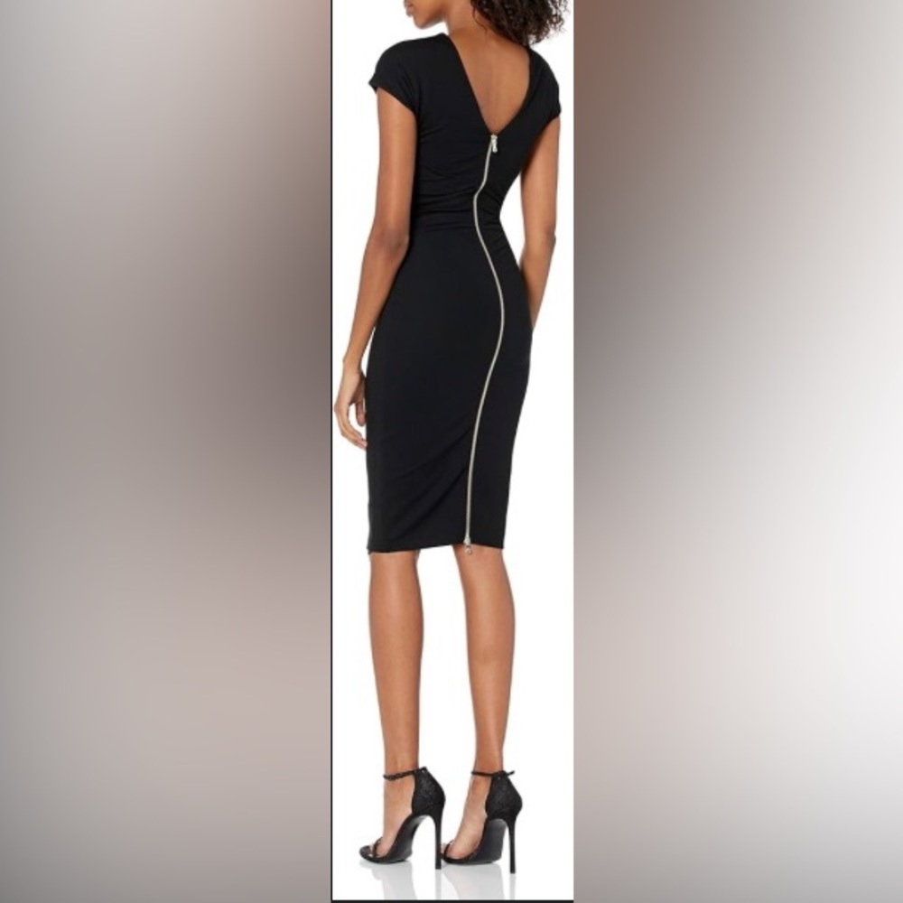 Ali and Jay black form fitting black dress with gold two way zipper on back
